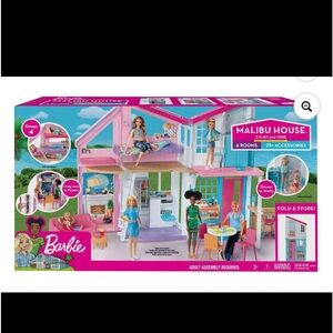 Barbie Malabo house w/Barbie doll included.no accessories excellent condition